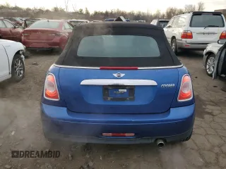 2014 MINI Convertible with VIN WMWZN3C53ET861225, listed as a Copart auction lot 87791665 with 104,151 mi miles and Salvage title. Bid and sale history available at DreamBid. Image 6.
