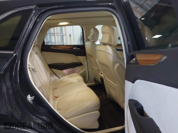 2015 Lincoln MKC with VIN 5LMCJ1A98FUJ10348, listed as a IAAI auction lot 41566416 with 133,035 mi miles and . Bid and sale history available at DreamBid. Image 8.