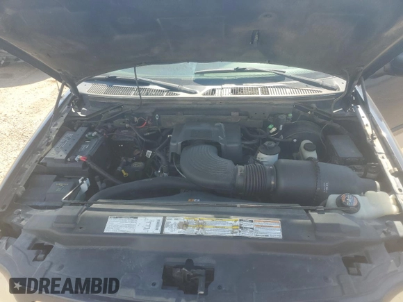 2001 Ford F-150 XL with VIN 1FTRX18L71NA27627, listed as a Copart auction lot 64190715 with 105,503 mi miles and Salvage title. Bid and sale history available at DreamBid. Image 11.