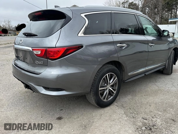 2016 Infiniti QX60 with VIN 5N1AL0MM8GC528432, listed as a Copart auction lot 56348655 with 134,122 mi miles and Clean Title. Bid and sale history available at DreamBid. Image 4.