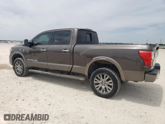 2016 Nissan Titan Platinum Reserve z VIN 1N6BA1F27GN507136, wystawiony jako Copart lot #53681615 z przebiegiem 155 101 mil mil oraz Czysty tytuł • Clean title. Historia ofert i sprzedaży dostępna na DreamBid. Obrazek 2.