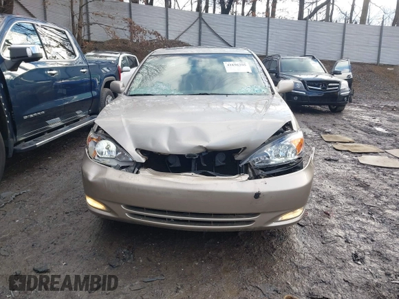 2003 Toyota Camry LE with VIN 4T1BE30K13U705105, listed as a IAAI auction lot 41696395 with 191,389 mi miles and . Bid and sale history available at DreamBid. Image 6.