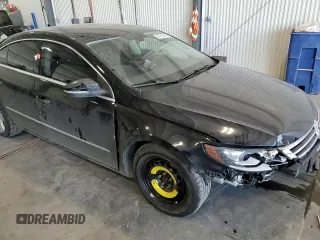 2014 Volkswagen CC Sport with VIN WVWBN7AN6EE529590, listed as a Copart auction lot 88780515 with 123,392 mi miles and Salvage Title. Bid and sale history available at DreamBid. Image 11.