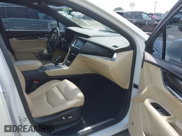 2017 Cadillac XT5 FWD with VIN 1GYKNARS3HZ225471, listed as a IAAI auction lot 42168166 with 149,685 mi miles and . Bid and sale history available at DreamBid. Image 5.