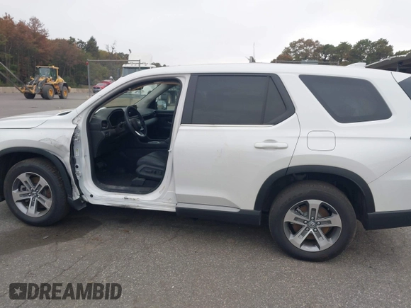 2023 Honda Pilot EX-L with VIN 5FNYG1H58PB016138, listed as a IAAI auction lot 40591717 with 10,068 mi miles and . Bid and sale history available at DreamBid. Image 14.