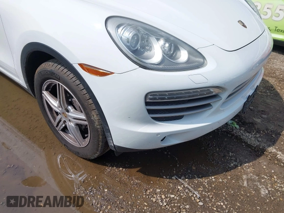 2014 Porsche Cayenne with VIN WP1AA2A21ELA94214, listed as a IAAI auction lot 42389334 with 114,276 mi miles and . Bid and sale history available at DreamBid. Image 6.