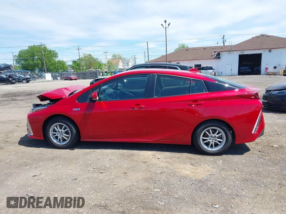 2021 Toyota Prius LE with VIN JTDKAMFP6M3192515, listed as a IAAI auction lot 42302003 with 74,247 mi miles and . Bid and sale history available at DreamBid. Image 14.