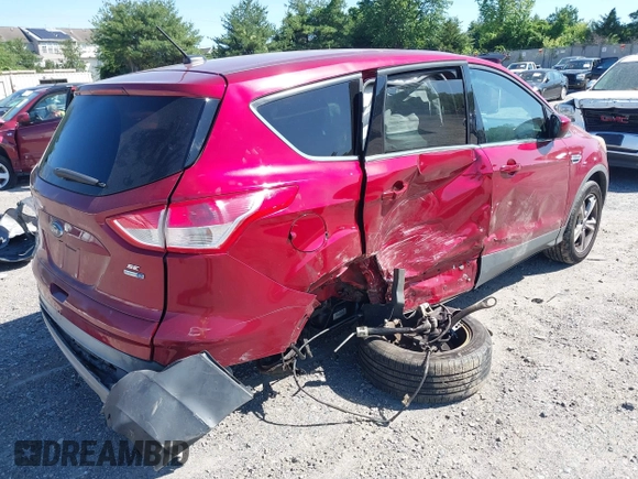 2014 Ford Escape SE with VIN 1FMCU9GX9EUB53450, listed as a IAAI auction lot 42313152 with 138,367 mi miles and . Bid and sale history available at DreamBid. Image 4.