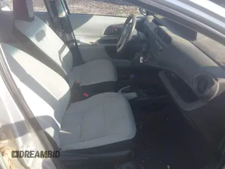 2014 Toyota Prius One z VIN JTDKDTB31E1563677, wystawiony jako IAAI lot #42134898 z przebiegiem 233 201 mil mil oraz . Historia ofert i sprzedaży dostępna na DreamBid. Obrazek 5.