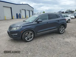 2015 Lincoln MKC z VIN 5LMTJ2AH9FUJ03616, wystawiony jako Copart lot #56681155 z przebiegiem 95 055 mil mil oraz Szkoda całkowita • Salvage title. Historia ofert i sprzedaży dostępna na DreamBid. Obrazek 1.
