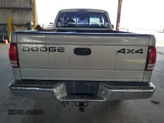 1999 Dodge Dakota SLT with VIN 1B7GG22Y0XS259031, listed as a Copart auction lot 87972505 with 153,354 mi miles and Salvage Title. Bid and sale history available at DreamBid. Image 6.
