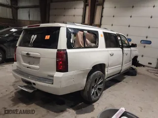 2017 Chevrolet Suburban Premier with VIN 1GNSKJKC6HR402877, listed as a IAAI auction lot 41422660 with 117,736 mi miles. Bid and sale history available at carsss.com. Image 4.