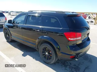 2015 Dodge Journey SXT with VIN 3C4PDCBG0FT595359, listed as a IAAI auction lot 41987773 with 135,528 mi miles. Bid and sale history available at carsss.com. Image 3.