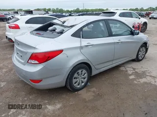 2015 Hyundai Accent GLS with VIN KMHCT4AE5FU883113, listed as a IAAI auction lot 41899701 with 123,023 mi miles and . Bid and sale history available at carsss.com. Image 4.