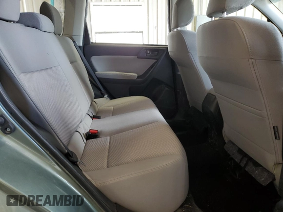 2015 Subaru Forester z VIN SA0123301, wystawiony jako Copart lot #54677574 z przebiegiem 58 430 mil mil oraz Szkoda całkowita • Salvage title. Historia ofert i sprzedaży dostępna na DreamBid. Obrazek 11.