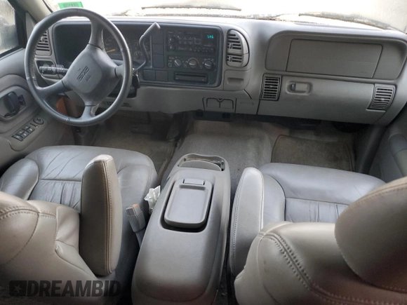 1999 GMC Suburban with VIN 3GKEC16R4XG536985, listed as a Copart auction lot 73421824 with 181,327 mi miles and Clean title. Bid and sale history available at DreamBid. Image 8.