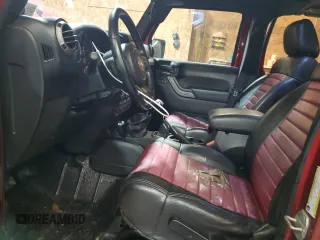 2012 Jeep Wrangler Unlimited Sport z VIN 1C4BJWDG8CL282181, wystawiony jako Copart lot #53863375 z przebiegiem 92 984 mil mil oraz Szkoda całkowita • Salvage title. Historia ofert i sprzedaży dostępna na DreamBid. Obrazek 7.