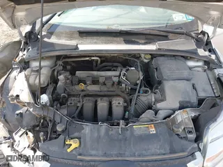 2013 Ford Focus SE with VIN 1FADP3F20DL174037, listed as a IAAI auction lot 41792552 with 131,984 mi miles. Bid and sale history available at carsss.com. Image 10.