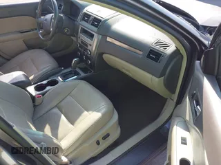 2011 Ford Fusion SEL with VIN 3FAHP0JAXBR295414, listed as a IAAI auction lot 41984604 with 164,909 mi miles. Bid and sale history available at carsss.com. Image 5.