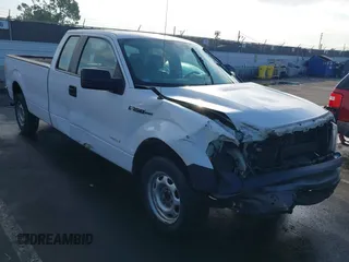 2014 Ford F-150 XL with VIN 1FTFX1CTXEKE24914, listed as a IAAI auction lot 41426666 with 141,451 mi miles. Bid and sale history available at carsss.com. Image 1.