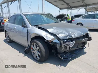 2005 Acura TSX with VIN JH4CL96895C010133, listed as a IAAI auction lot 42785200 with 166,555 mi miles and . Bid and sale history available at DreamBid. Image 1.