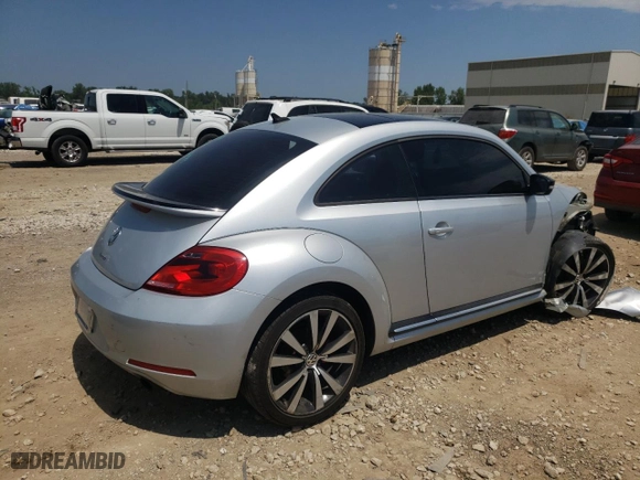 2012 Volkswagen Beetle 2.0T Turbo w/Sun/Sound PZEV with VIN 3VWVA7AT7CM664802, listed as a Copart auction lot 64850314 with 102,107 mi miles and Salvage Title. Bid and sale history available at carsss.com. Image 3.