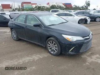 2015 Toyota Camry XLE z VIN 4T4BF1FK6FR447473, wystawiony jako IAAI lot #41521550 z przebiegiem 151 213 mil mil oraz . Historia ofert i sprzedaży dostępna na DreamBid. Obrazek 1.