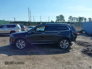 2023 Cadillac XT6 AWD Premium Luxury with VIN 1GYKPDRS8PZ153838, listed as a IAAI auction lot 41838527 with 60,034 mi miles and . Bid and sale history available at DreamBid. Image 14.