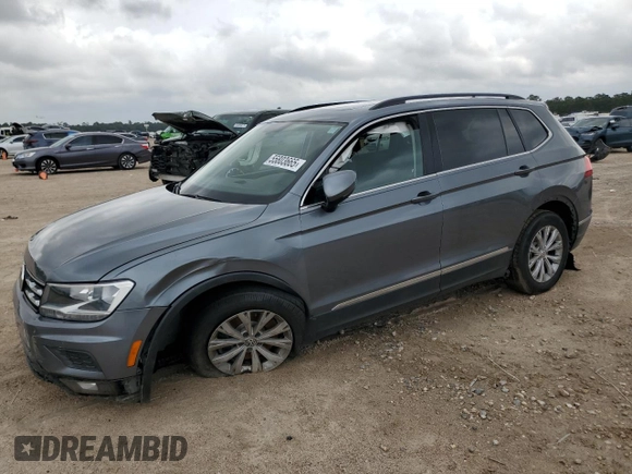 2018 Volkswagen Tiguan SEL z VIN 3VV2B7AX7JM004960, wystawiony jako Copart lot #55803665 z przebiegiem 102 492 mil mil oraz Szkoda całkowita • Salvage title. Historia ofert i sprzedaży dostępna na DreamBid. Obrazek 1.