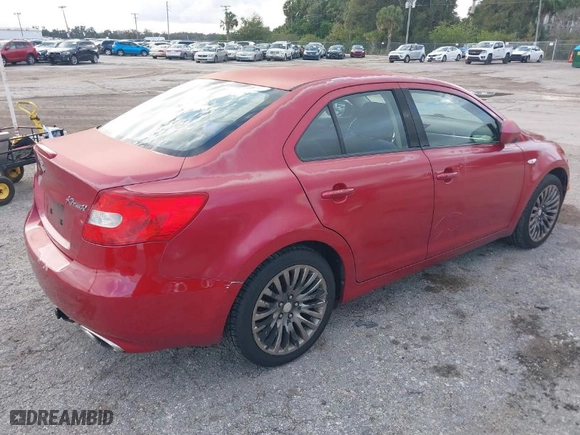 2012 Suzuki Kizashi SE with VIN JS2RE9A31C6101027, listed as a IAAI auction lot 41213426 with 174,490 mi miles. Bid and sale history available at carsss.com. Image 4.