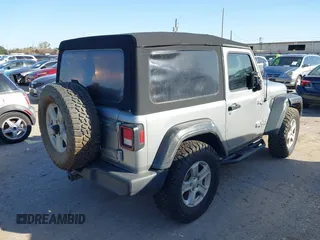 2018 Jeep Wrangler Sport S with VIN 1C4GJXAG0JW156196, listed as a IAAI auction lot 41193078 with 80,428 mi miles and . Bid and sale history available at DreamBid. Image 4.