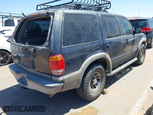 1999 Ford Explorer z VIN 1FMZU32X6XZA93597, wystawiony jako IAAI lot #42138855 z przebiegiem 190 449 mil mil oraz . Historia ofert i sprzedaży dostępna na DreamBid. Obrazek 4.