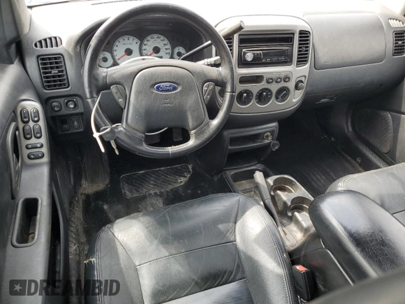 2003 Ford Escape Limited z VIN 1FMCU941X3KC33512, wystawiony jako Copart lot #51029495 z przebiegiem 146 616 mil mil oraz Szkoda całkowita • Salvage title. Historia ofert i sprzedaży dostępna na DreamBid. Obrazek 8.