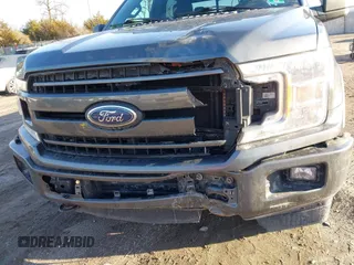2018 Ford F-150 XL with VIN 1FTEW1EG2JFE55513, listed as a IAAI auction lot 41530354 with 132,617 mi miles. Bid and sale history available at carsss.com. Image 18.