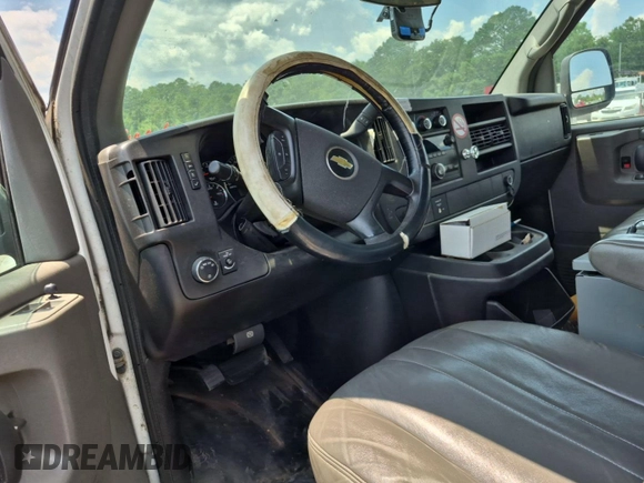 2014 Chevrolet Express Cargo with VIN 1GCWGFCG4E1148722, listed as a IAAI auction lot 42785369 with 188,945 mi miles and . Bid and sale history available at DreamBid. Image 28.