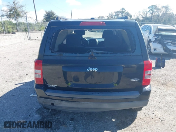 2014 Jeep Patriot Latitude with VIN 1C4NJPFA6ED680773, listed as a IAAI auction lot 41569916 with 135,590 mi miles and . Bid and sale history available at carsss.com. Image 16.