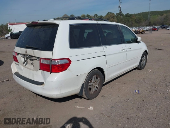 2006 Honda Odyssey EX-L z VIN 5FNRL387X6B452405, wystawiony jako IAAI lot #41884680 z przebiegiem 333 366 mil mil oraz . Historia ofert i sprzedaży dostępna na DreamBid. Obrazek 4.