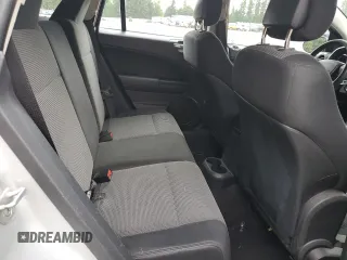 2010 Dodge Caliber SXT z VIN 1B3CB4HAXAD605621, wystawiony jako Copart lot #59040275 z przebiegiem 191 401 mil mil oraz Szkoda całkowita • Salvage title. Historia ofert i sprzedaży dostępna na DreamBid. Obrazek 11.
