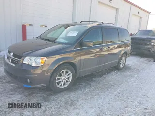 2019 Dodge Grand Caravan SXT with VIN 2C4RDGCG9KR637121, listed as a IAAI auction lot 41636355 with 177,073 mi miles and . Bid and sale history available at DreamBid. Image 2.