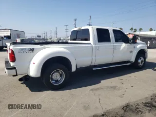 2014 Ford F-450 XL with VIN 1FT8W4DTXEEB28690, listed as a Copart auction lot 75767634 with 284,347 mi miles and Salvage Title. Bid and sale history available at carsss.com. Image 3.