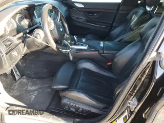 2015 BMW M6 z VIN WBS6C9C5XFD467952, wystawiony jako Copart lot #46312895 z przebiegiem 79 807 mil mil oraz Szkoda całkowita • Salvage title. Historia ofert i sprzedaży dostępna na DreamBid. Obrazek 7.