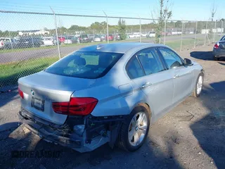2017 BMW 3 Series 330i with VIN WBA8B9G30HNU57209, listed as a IAAI auction lot 40523376 with 94,338 mi miles. Bid and sale history available at carsss.com. Image 4.