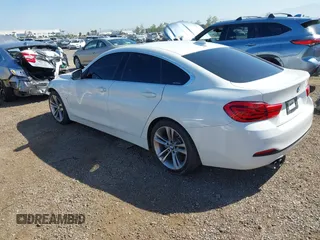 2019 BMW 4 Series 430i with VIN WBA4J1C54KBM18190, listed as a IAAI auction lot 42012759 with 73,598 mi miles. Bid and sale history available at carsss.com. Image 3.