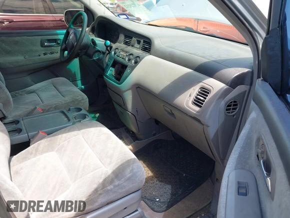 2004 Honda Odyssey EX with VIN 5FNRL18694B076305, listed as a IAAI auction lot 41929212 with 287,717 mi miles and . Bid and sale history available at DreamBid. Image 5.