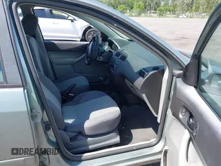 2006 Ford Focus SE with VIN 1FAHP36N26W227530, listed as a IAAI auction lot 42177662 with 115,711 mi miles and . Bid and sale history available at carsss.com. Image 5.