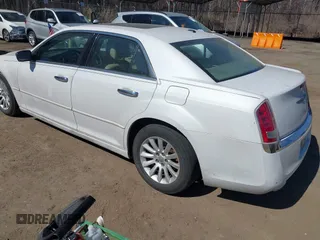 2013 Chrysler 300 with VIN 2C3CCAAG0DH508643, listed as a IAAI auction lot 41765128 with 203,871 mi miles. Bid and sale history available at carsss.com. Image 3.