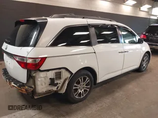 2013 Honda Odyssey EX-L with VIN 5FNRL5H66DB071151, listed as a IAAI auction lot 41914345 with 194,804 mi miles and . Bid and sale history available at carsss.com. Image 4.