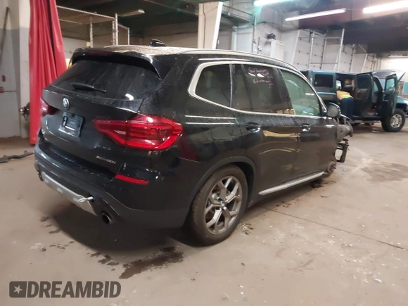 2021 BMW X3 xDrive30i with VIN 5UXTY5C09M9E77981, listed as a IAAI auction lot 41965697 with 61,723 mi miles and . Bid and sale history available at DreamBid. Image 4.