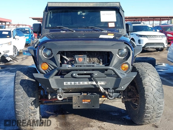 2008 Jeep Wrangler Unlimited Rubicon with VIN 1J8GA69158L616452, listed as a IAAI auction lot 41391875 with 91,143 mi miles and . Bid and sale history available at DreamBid. Image 13.