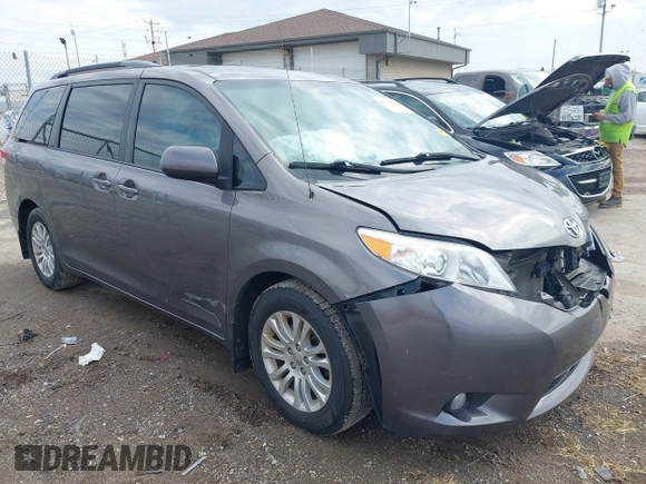 2014 Toyota Sienna XLE with VIN 5TDYK3DC4ES463315, listed as a IAAI auction lot 42108050 with 197,140 mi miles. Bid and sale history available at carsss.com. Image 1.